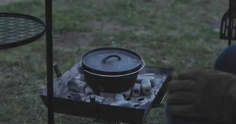 Cooking over campfire Stock Footage 163001059