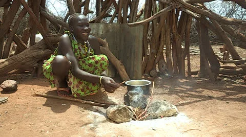 Cooking over fire Stock Footage 23082063