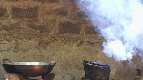 Cooking Over Fire Steam Stock Footage 54806812