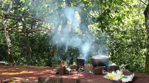 Cooking overt fire wide shot Stock-Footage 26187201