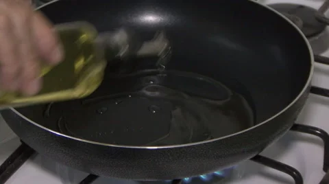 Cooking with pan Stock Footage