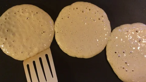 Cooking pancakes for breakfast Stock Footage 86715855