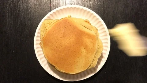 Cooking pancakes for breakfast Stock Footage 86715915