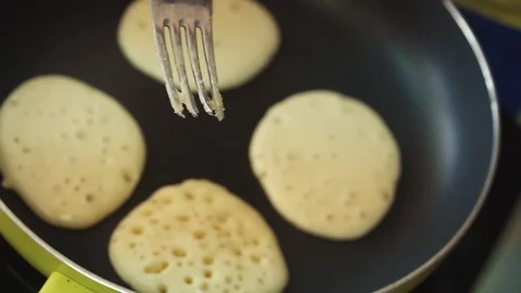 Cooking pancakes in a pan Stock-Footage 86855567