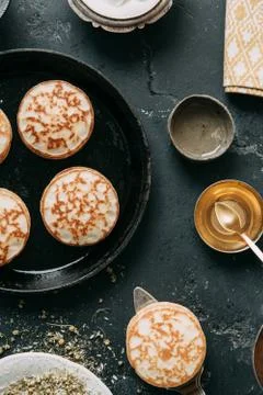 Cooking pancakes Stock Photos