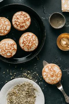 Cooking pancakes Stock Photos