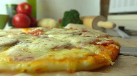 Cooking, part of the set. Taking a piece of freshly baked homemade pizza with Stock Footage 66545247