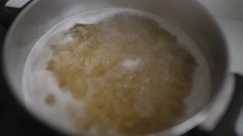 Cooking pasta in boiling water Stock Footage 260255955