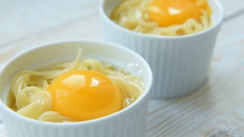 Cooking pasta with egg and bacon Stock Footage 69748587