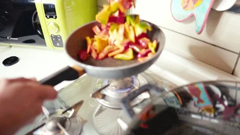 Cooking peppers in a pan Video stock 138214049