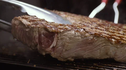 Cooking perfect steak Stock Footage 64478682