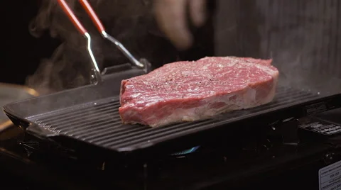 Cooking perfect steak Stock Footage 64478819