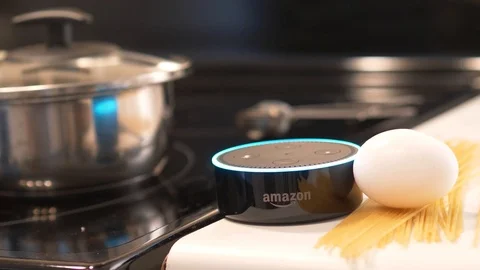 Cooking With a Personal Smart Assistant Device From Amazon Alexa 스톡 동영상 93566873