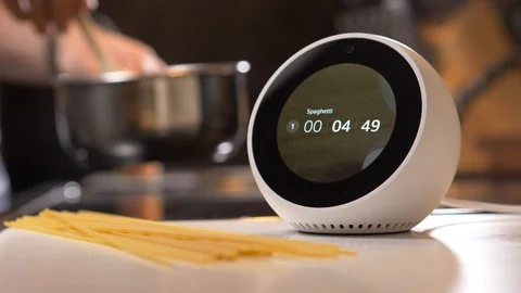 Cooking With a Personal Smart Assistant Setting Timer Amazon Echo Alexa Spot Stock Footage 94031167
