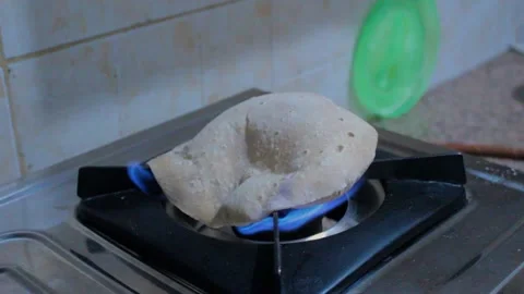 Cooking Phulka / Chapati / Indian Bread made from Wheat Video stock 160212813