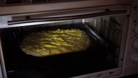 Cooking pie in the oven Stock Footage 106197918