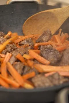 Cooking pilaf in a cauldron. A step by step recipe for cooking pilaf, cut the Stock Photos