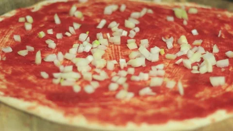 Cooking pizza adding ingredients to the pizza tomato sauce Video stock 146288949