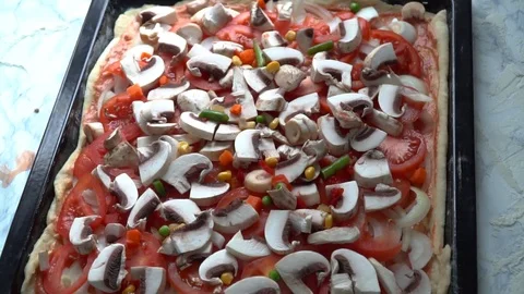 Cooking pizza. Adding vegetables. Stock Footage 84098862