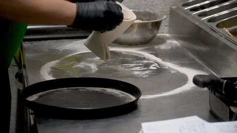 Cooking pizza in the frame close-up hands and pizza 库存影片 127057465