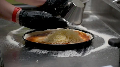 Cooking pizza in the frame close-up hands and pizza 库存影片 127057919