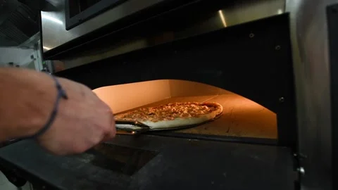 Cooking pizza in the kitchen 動画素材 149944062