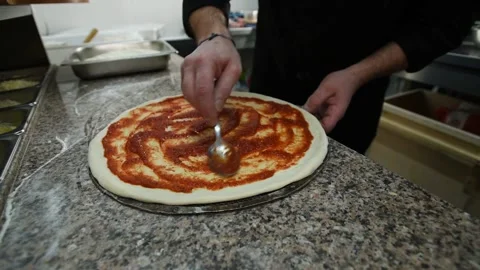 Cooking pizza in the kitchen 動画素材 149944066