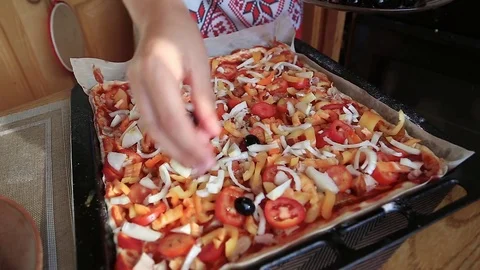 Cooking pizza with olives Stock Footage 79758716