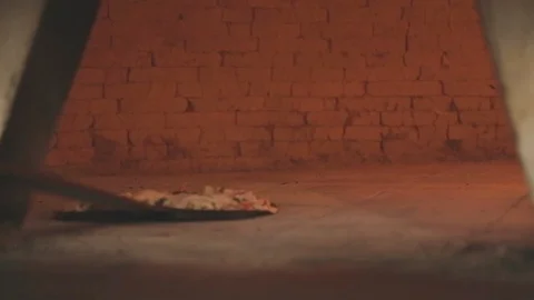 Cooking pizza in the oven Stock Footage 88170866