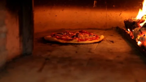 Cooking pizza in the oven Stock Footage 89477934