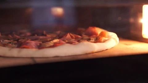 Cooking pizza in the oven Stock Footage 112755168