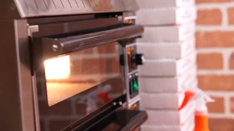 Cooking pizza in the oven Stock Footage 112755531