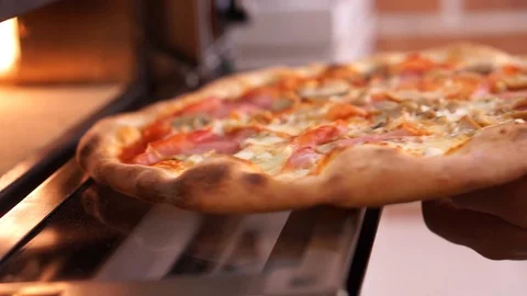 Cooking pizza in the oven Stock Footage 112755638
