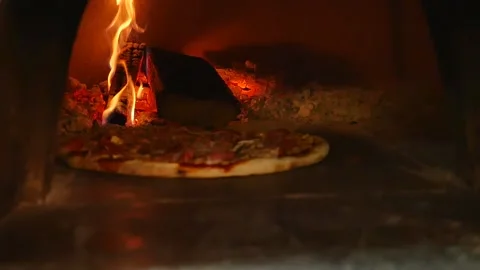 Cooking pizza in the oven Stock Footage 151918680