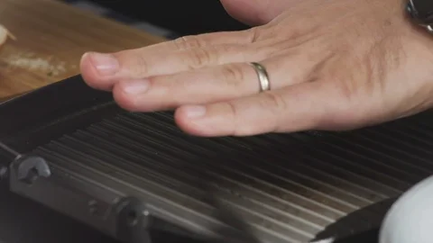 Cooking: Placing Burger Bread Buns On A Frying Pan For Roasting (Male Chef Hand) 스톡 동영상 118593355