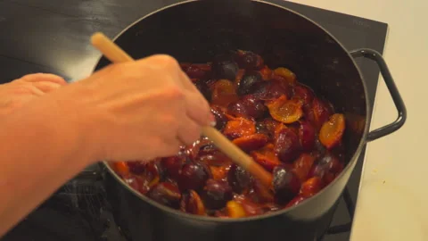 Cooking plum jam Stock Footage 145684381