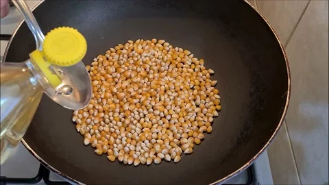 Cooking Popcorn In A Pan Stock Footage 157443528