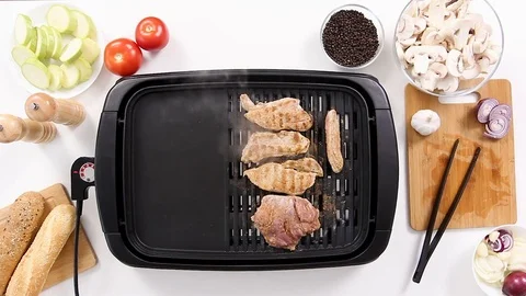 Cooking pork meat on grill Stock-Footage 85316459