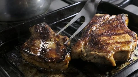Cooking pork steak Video stock 166748367