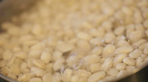 Cooking a pot of beans Stock Footage 61496333