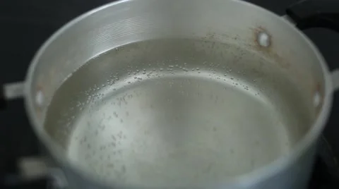 Cooking pot on the fire with boiling water Stock Footage 54826019