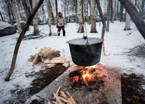 Cooking in a pot on the fire Stock Photos