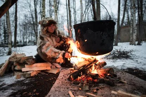 Cooking in a pot on the fire Stock Photos