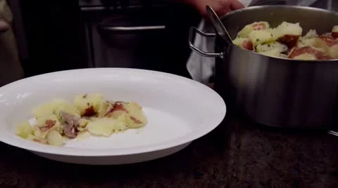 Cooking potatoes Stock Footage 13146775