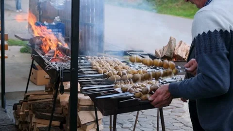 Cooking potatoes on grill Stock Footage 260192183
