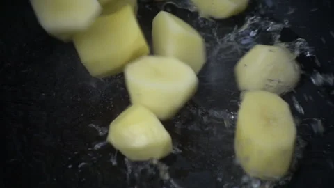 Cooking potatoes in super slow motion Stock Footage 95967378