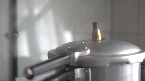 Cooking in a pressure cooker Stock Footage 170421937