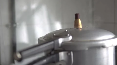 Cooking in a pressure cooker Stock Footage 170422077