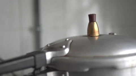 Cooking in a pressure cooker Stock Footage 170422341