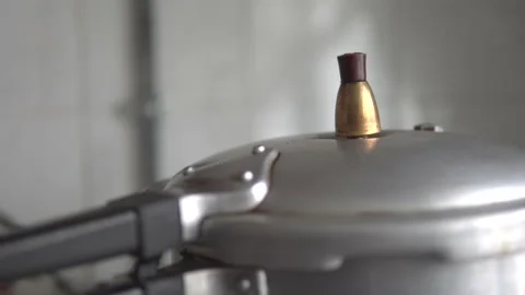 Cooking in a pressure cooker Stock Footage 170422429